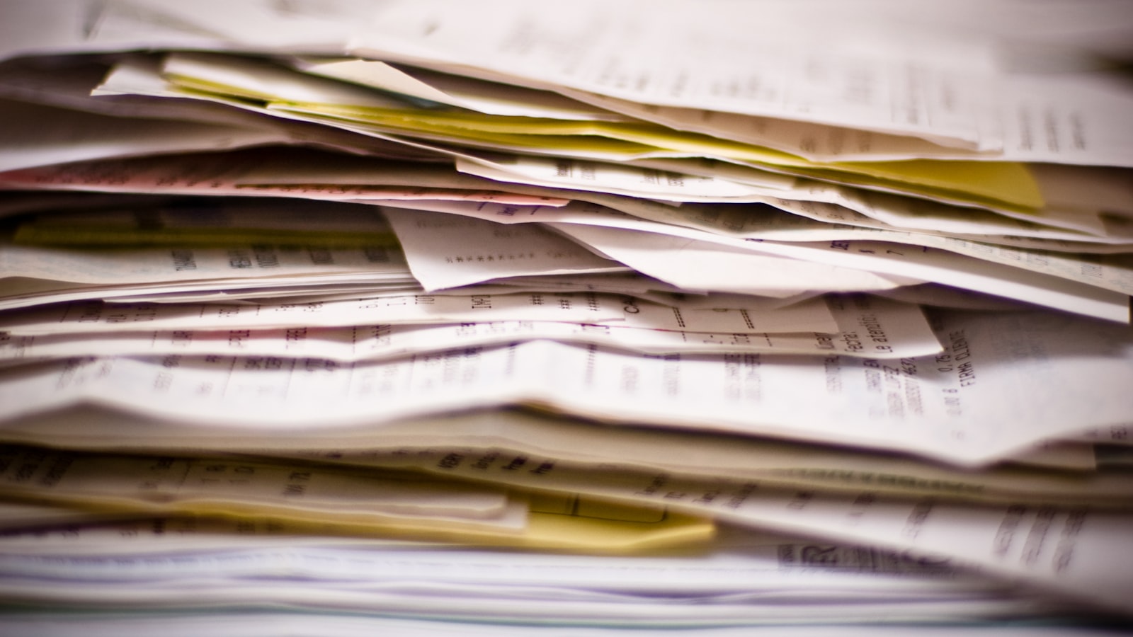 A close-up of a stack of papers.
